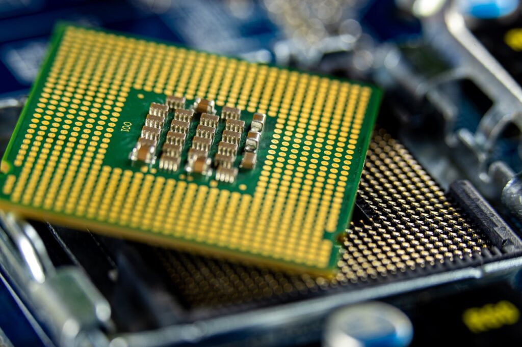 A computer processor with circular gold plated parts. 