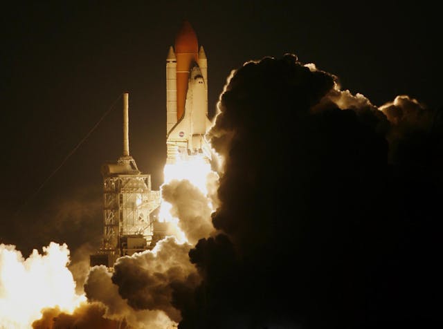 Rocket launch at night