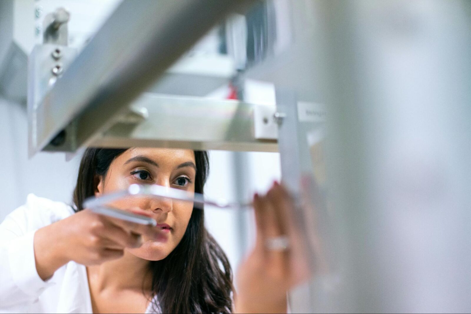 An engineer working on equipment